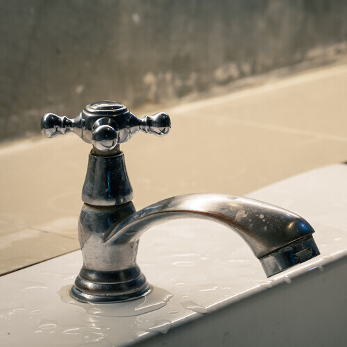 closeup of a bathroom faucet