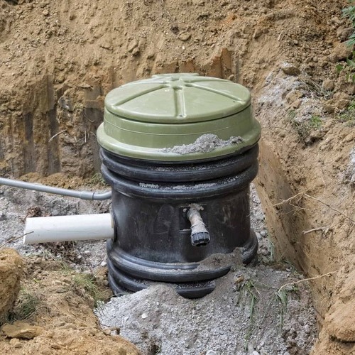 grinder pump in the ground